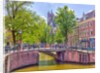 Canal through Amsterdam city by Assaf Frank
